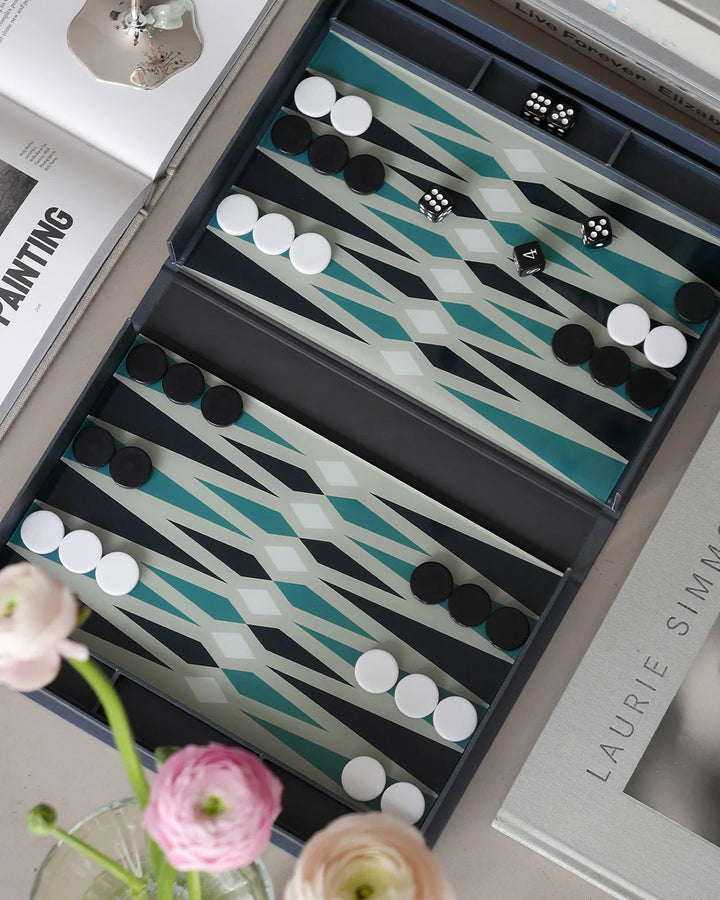 Classic backgammon set in book-style storage box with elegant black and blue design for family game nights and home décor