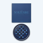 Wooden solitaire game with round board and marbles for classic strategy play