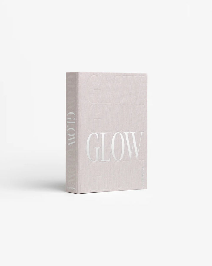Glow jewellery box with soft pink velvet-lined compartments and elegant book-inspired storage design