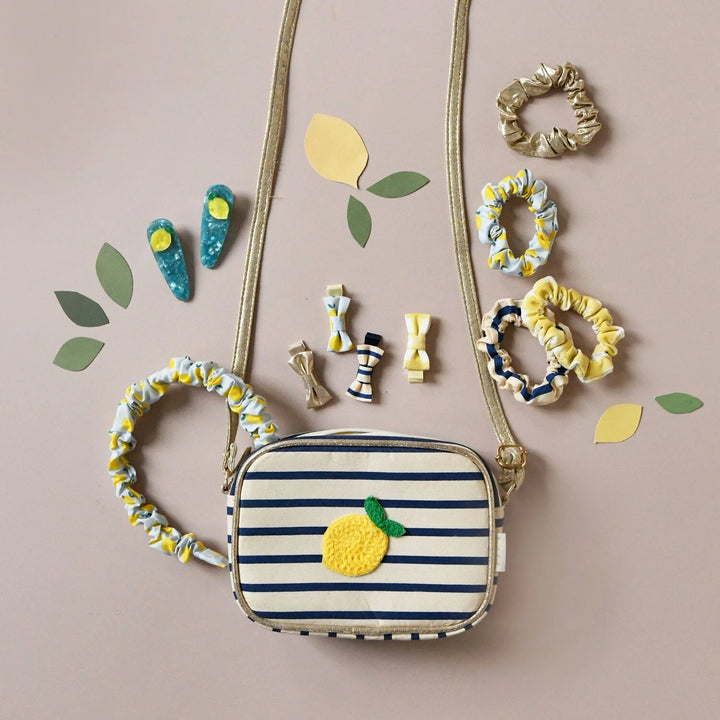 Rockahula Lemon Drop stripy kids bag with bold stripe design and zip closure