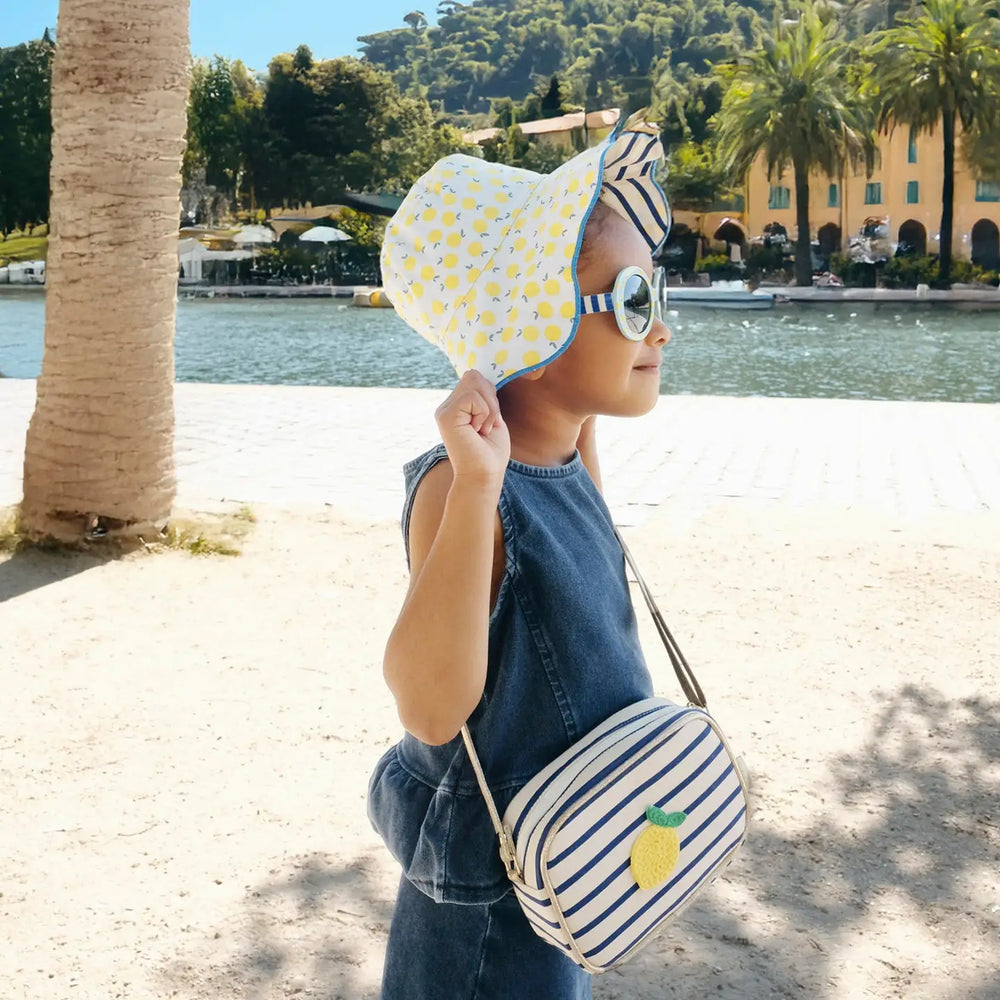 Rockahula Lemon Drop stripy reversible sun hat for kids with lemon print and striped pattern 