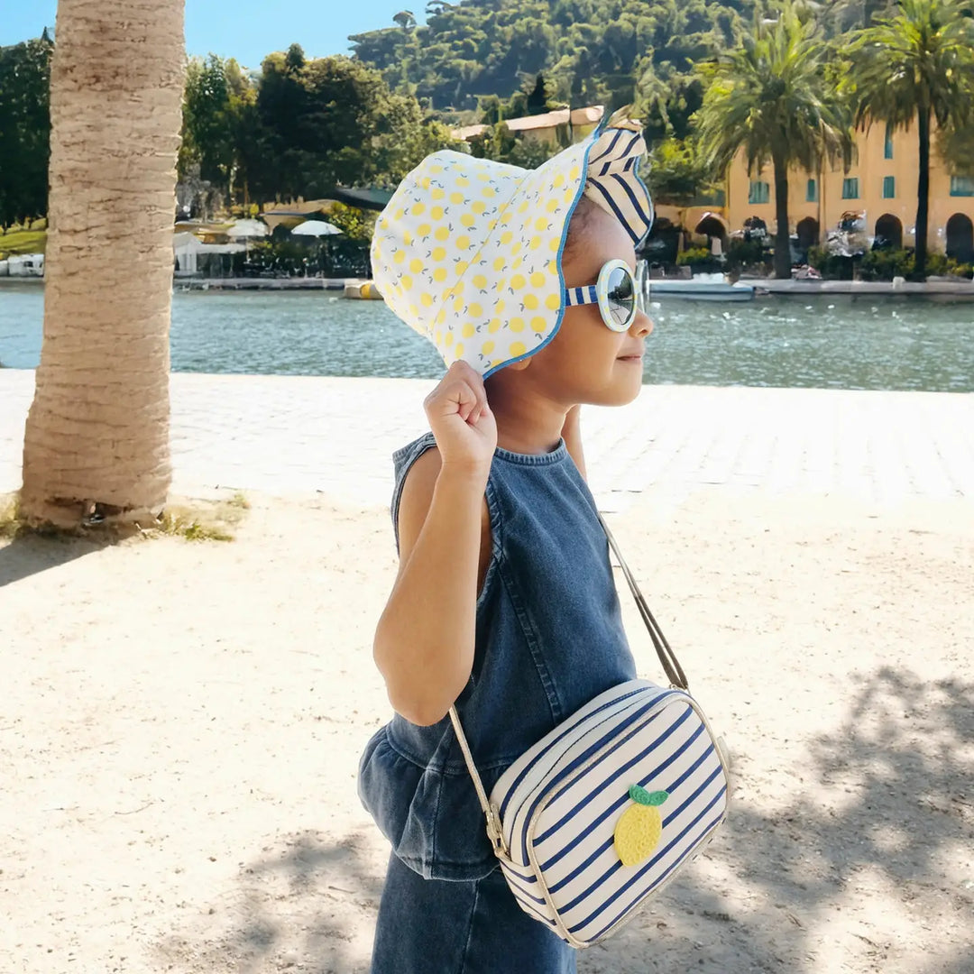 Rockahula Lemon Drop stripy reversible sun hat for kids with lemon print and striped pattern 