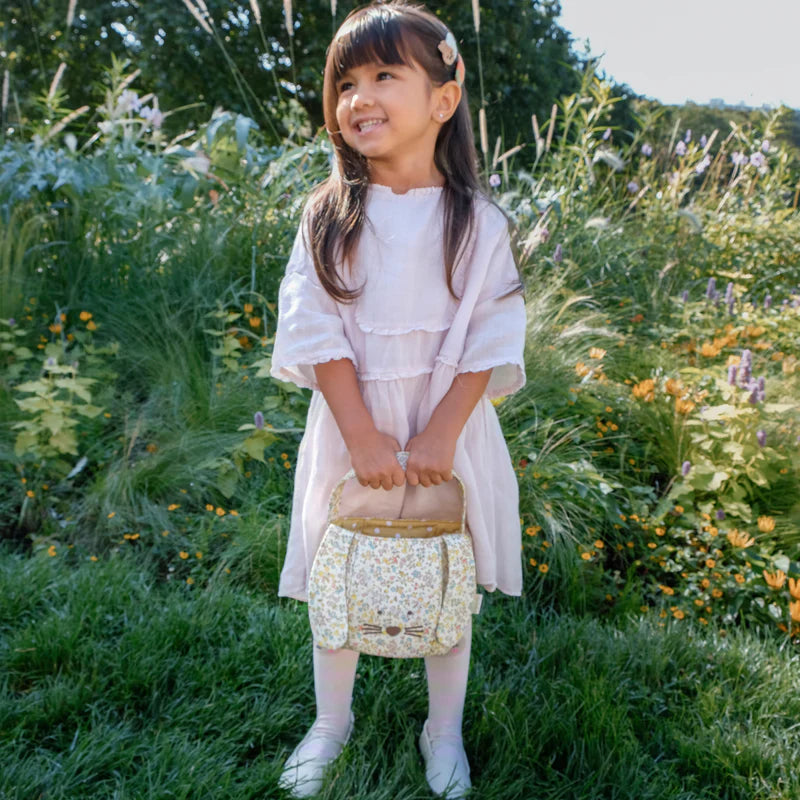 Rockahula petal bunny kids bucket bag with bunny ears and floral accents on girl