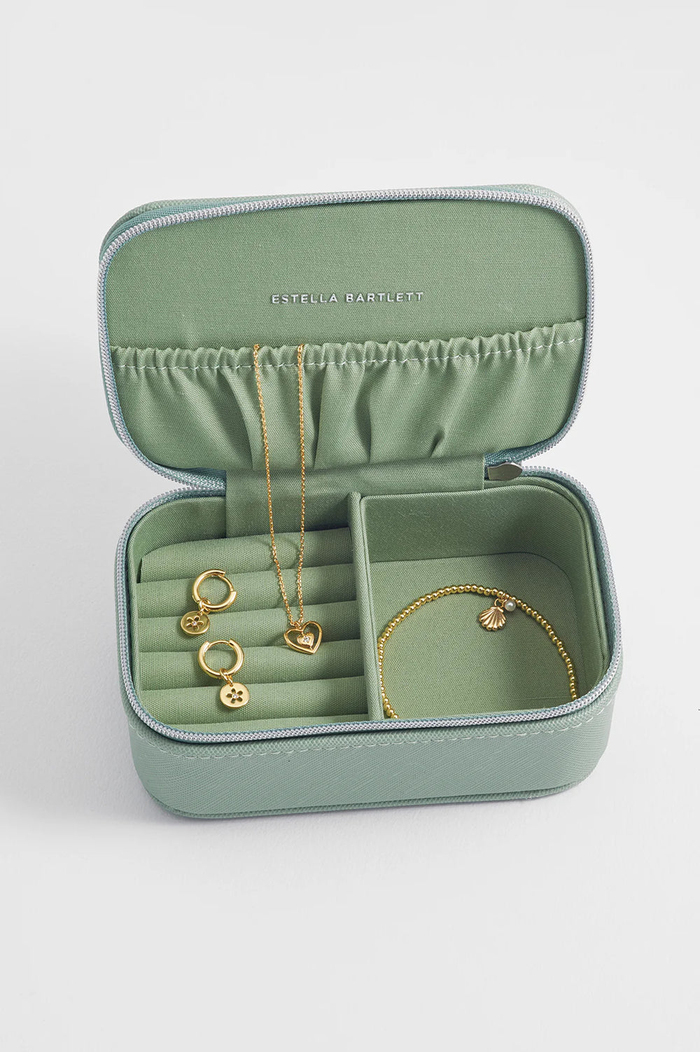 Estella Bartlett green mini jewellery box in vegan leather with zip closure